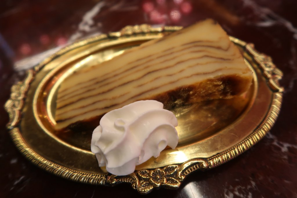 Bebinca dessert on gold plate