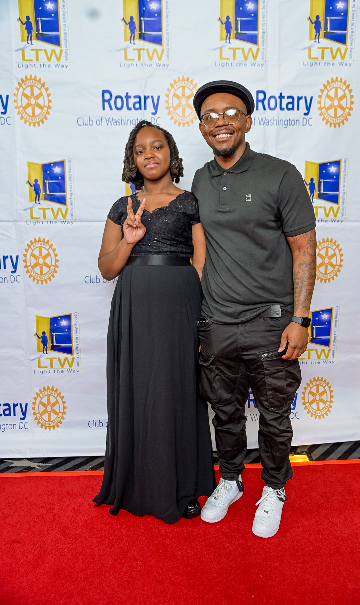 A woman and a man posing on the Red Carpet at the 2026 Premiere
