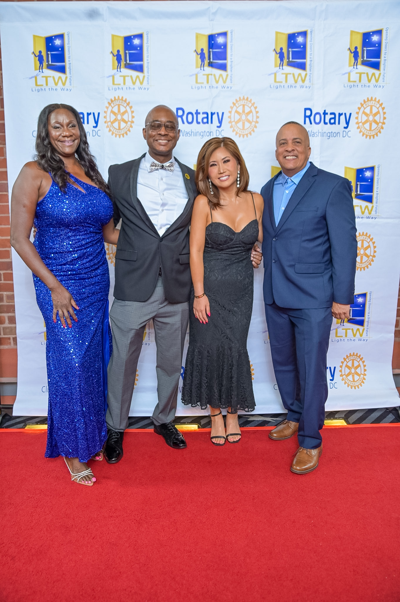 Four adults posing together on the Red Carpet at the 2026 Premiere