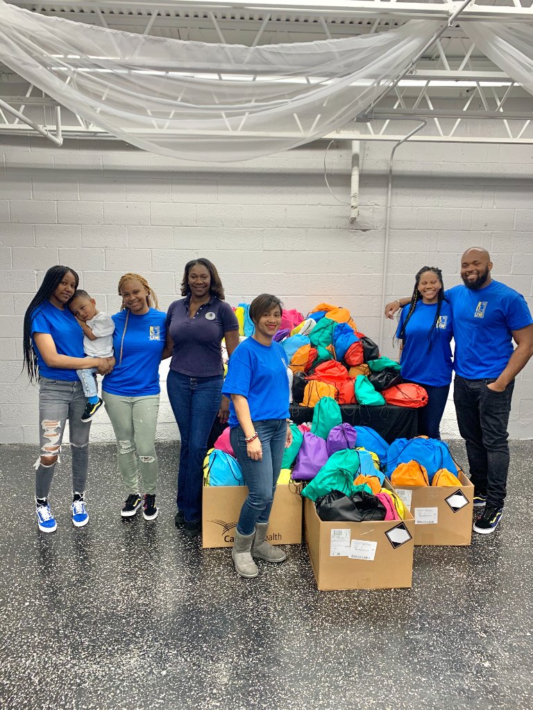 Community Outreach team with packed bags