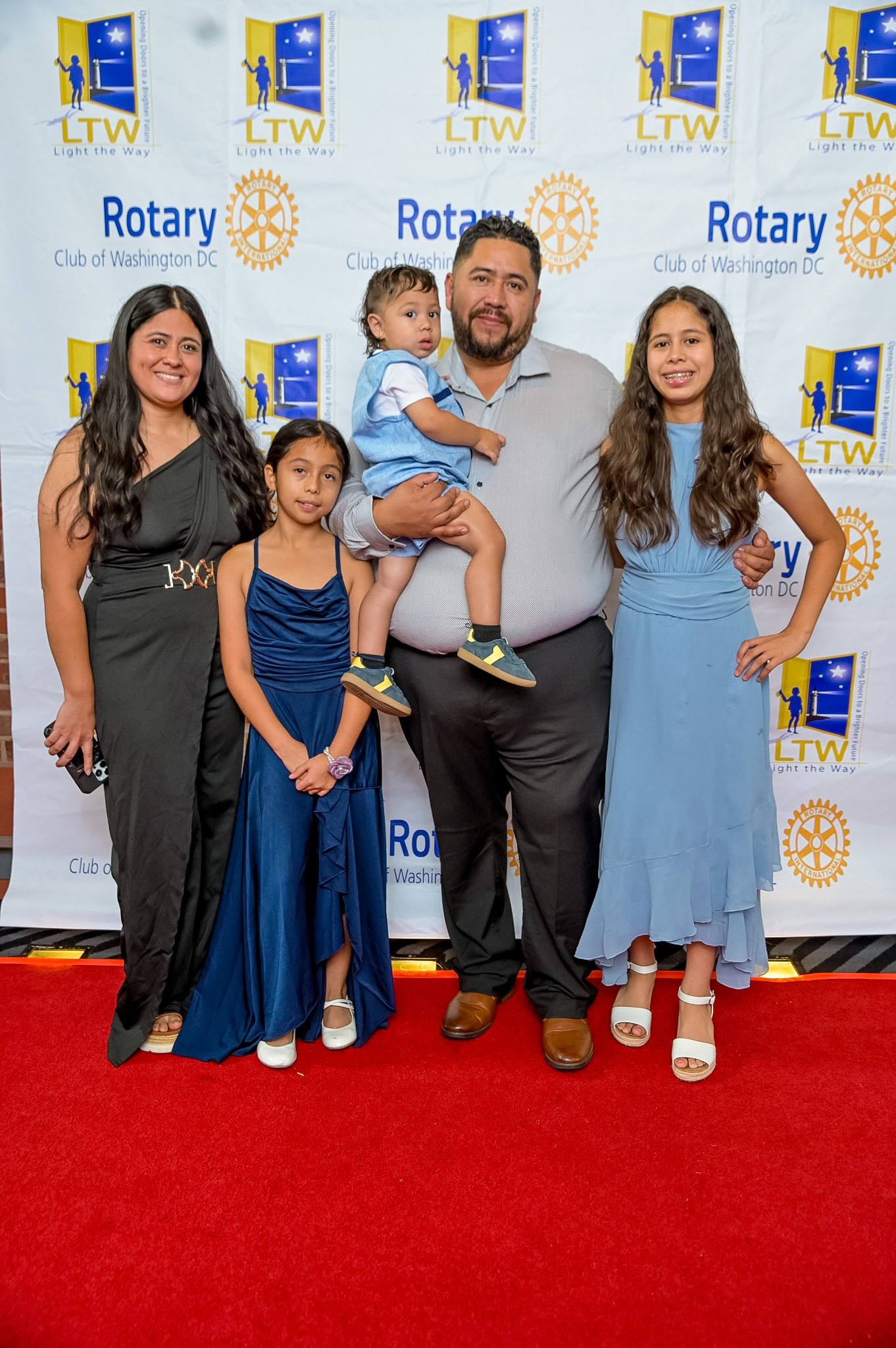 Family of five posing on the Red Carpet at the 2026 Premiere