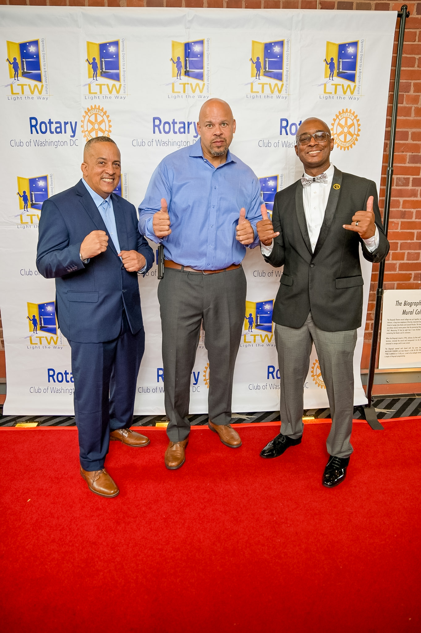 Three men posing on the Red Carpet at the 2026 Premiere