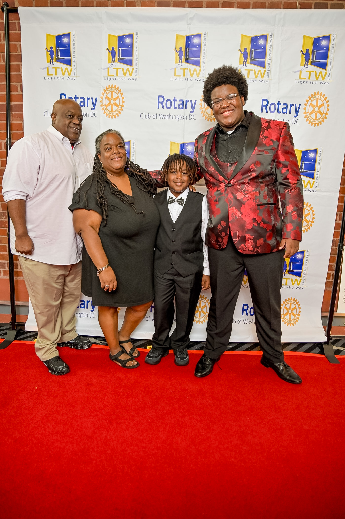 Four guests posing on the Red Carpet at the 2026 Premiere