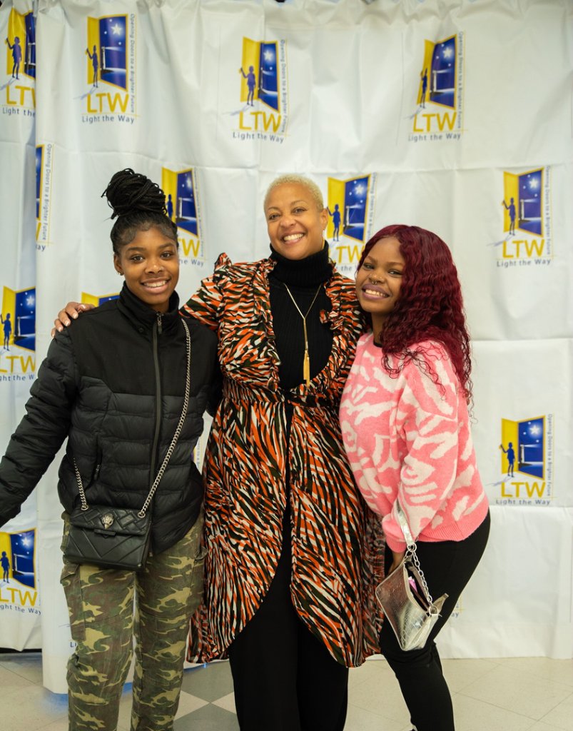 Youth Empowerment Seminar attendees at LTW backdrop