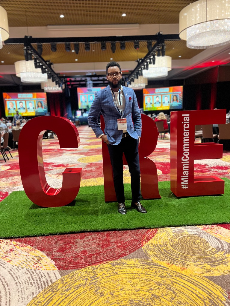 Luckner Dorcy at a commercial real estate conference