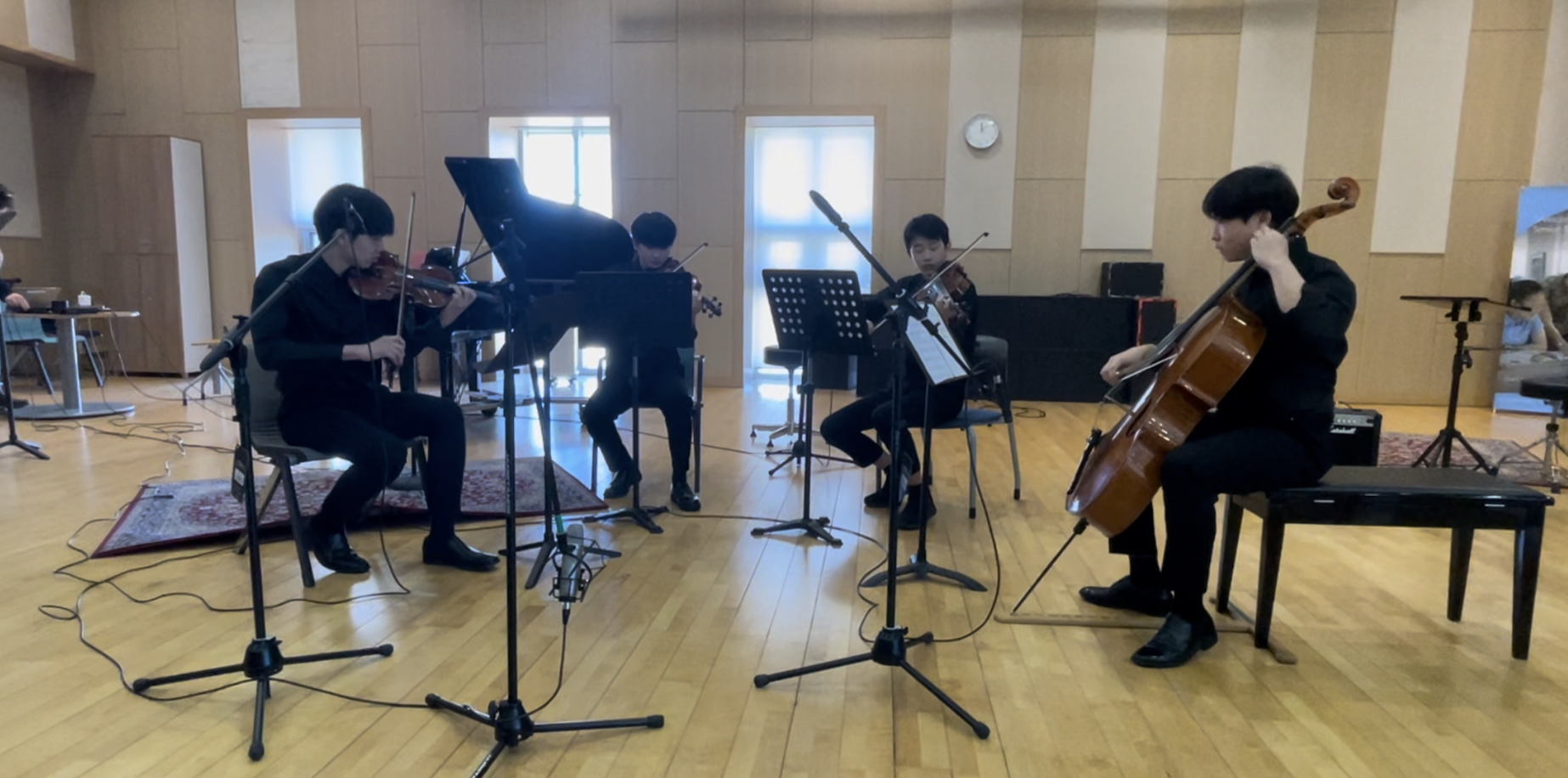 Student composition live recording session in a rehearsal hall