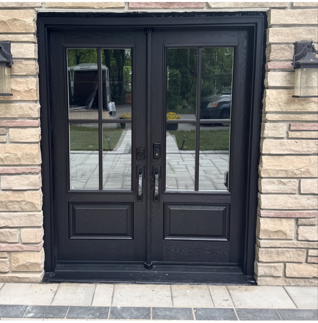 Double door installation — Toronto GTA technician on site