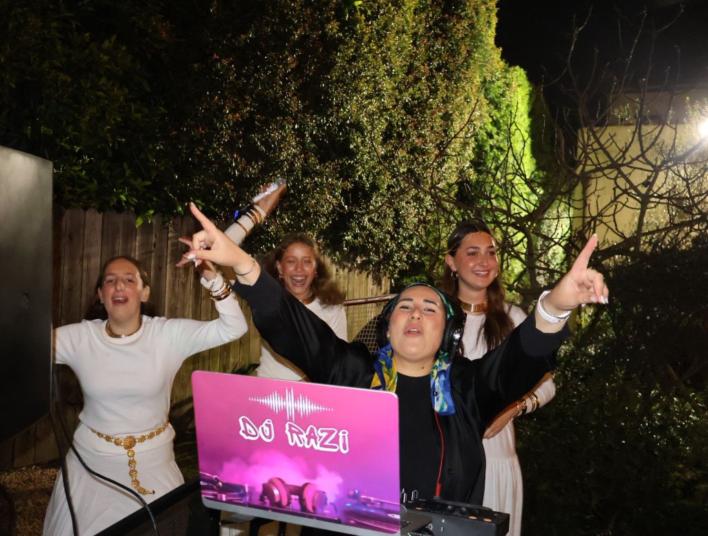 DJ Razi with guests celebrating