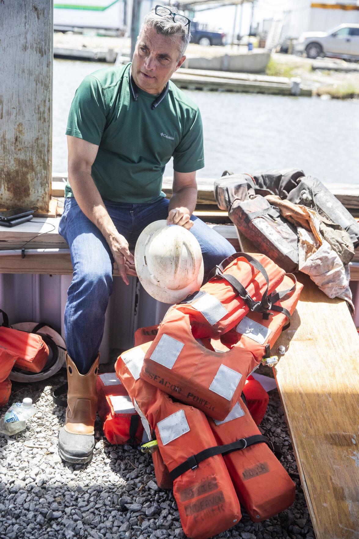 Todd Terell seated beside rescue equipment