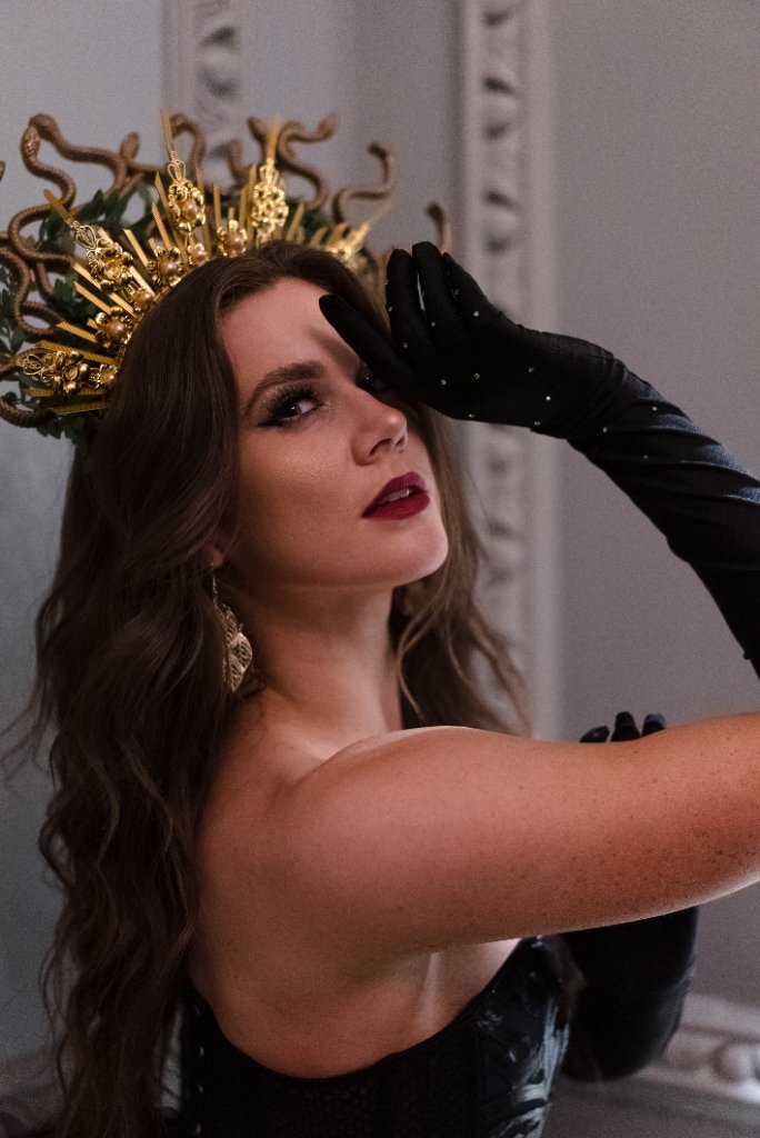 Medusa showgirl with gold serpent headpiece London