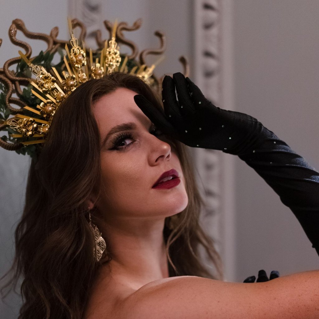 Luxury showgirl portrait with gold crown London