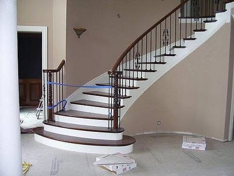 Curved Grand Stair — Iron Balusters