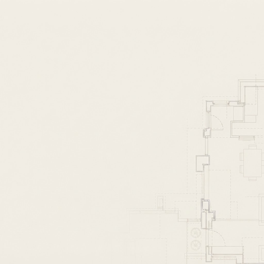 Faded architectural floor plan on warm ivory paper