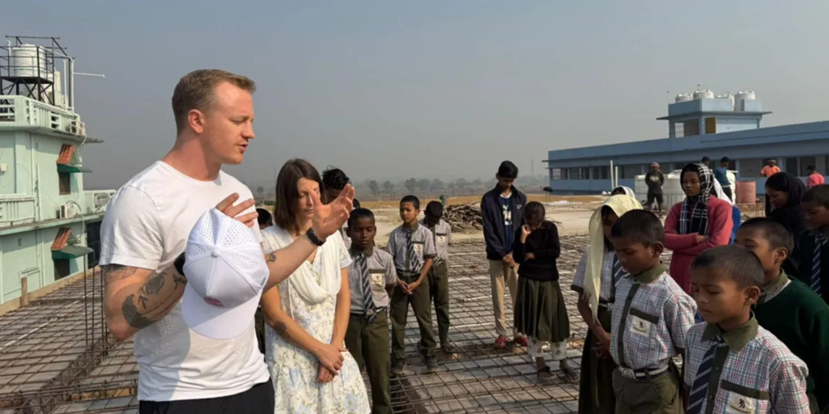 Praying on the rooftop with children