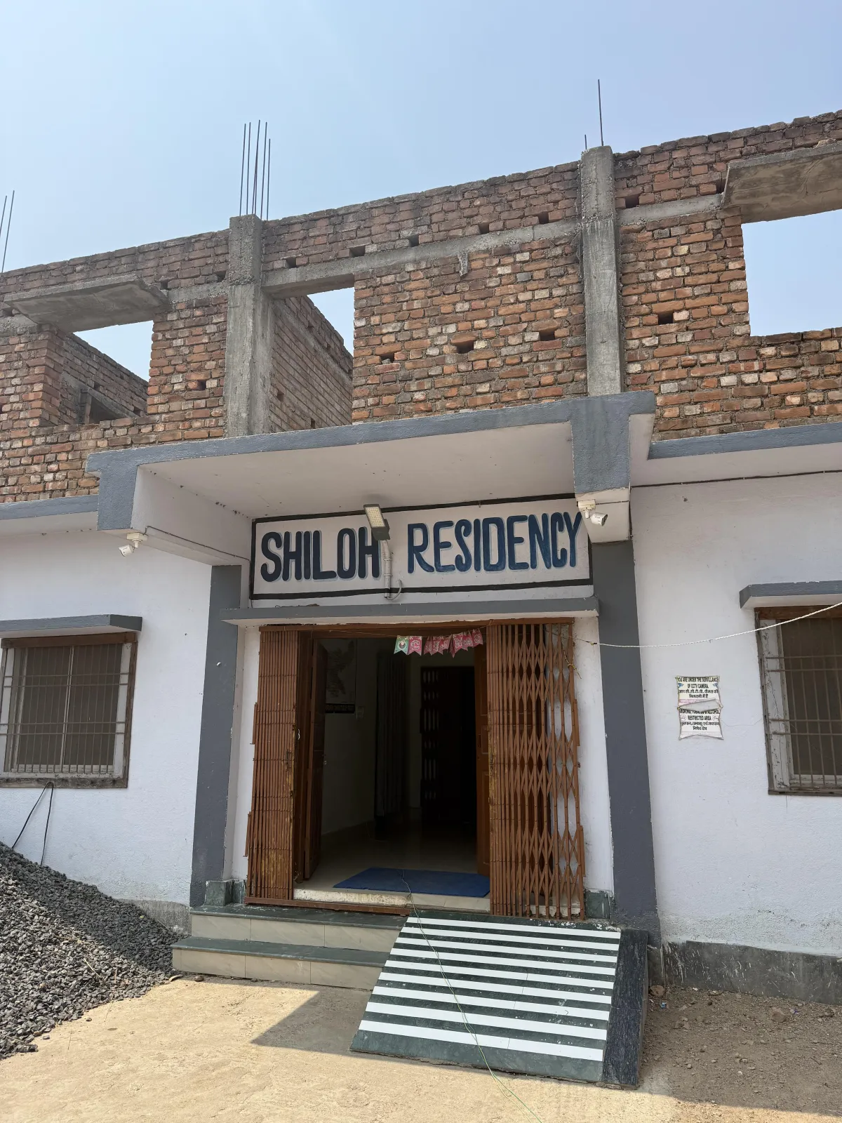 James and Ginny with the children of Shiloh Residency