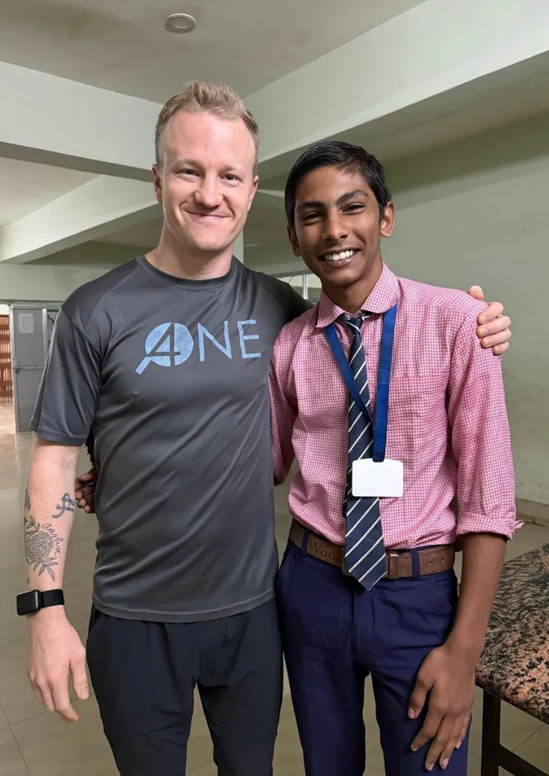 James with a young man in Pakur