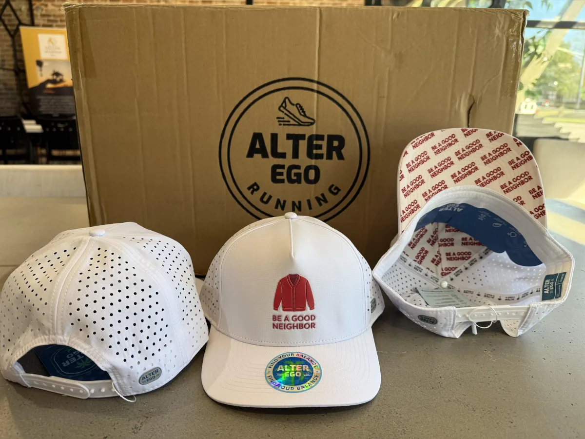 BE A GOOD NEIGHBOR white cap — three views with Alter Ego Running box