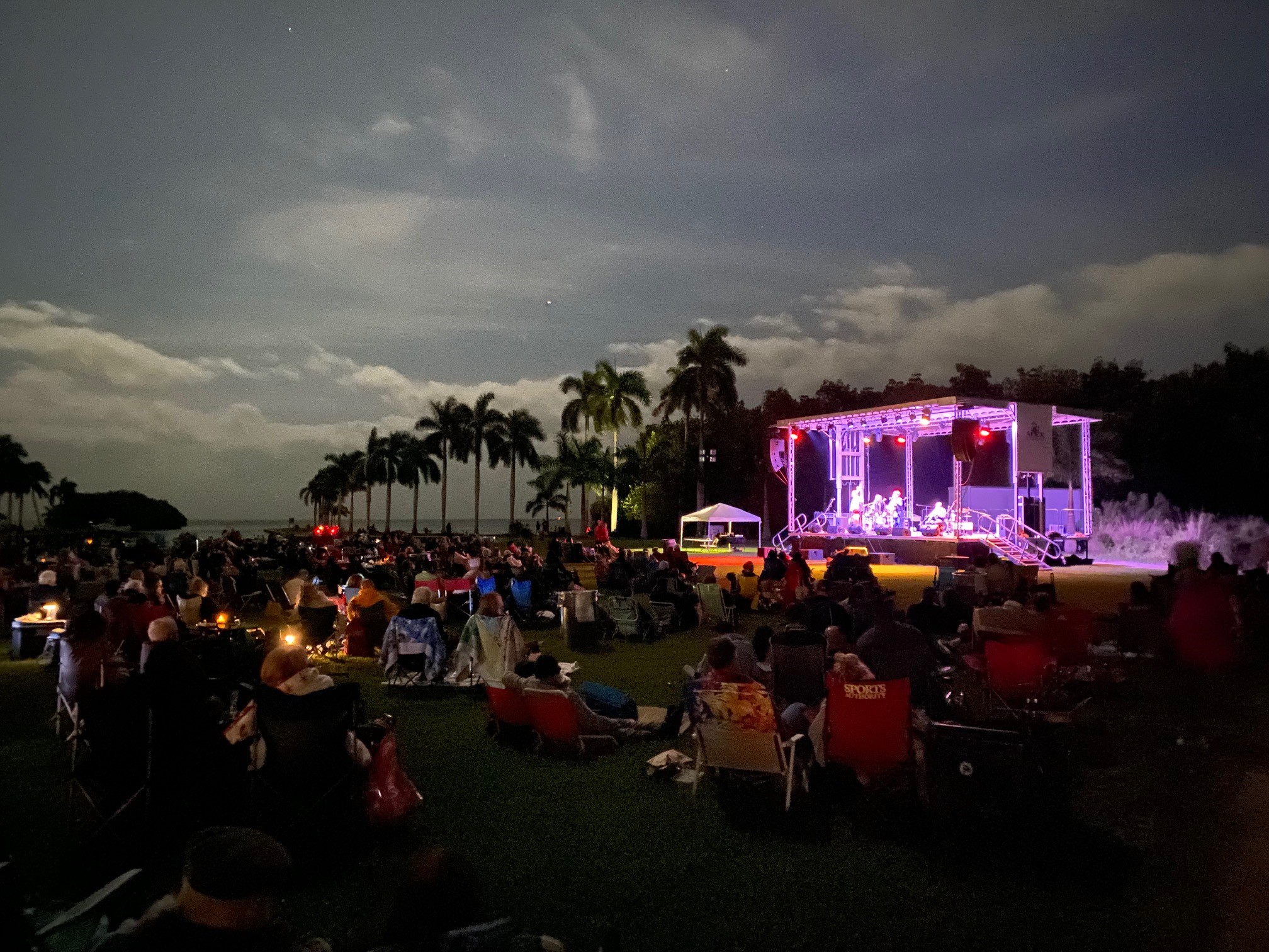 Outdoor community concert at night on an APEX 3224 mobile stage — outdoor event production in Georgia by Audio Visual Genius LLC