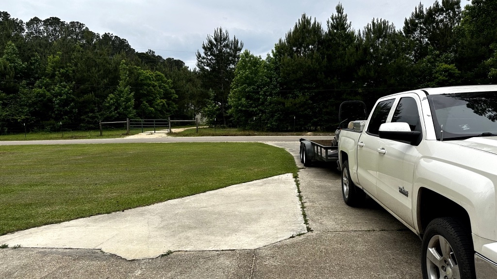 Monument Site Services truck and equipment ready for contractor jobsite support and property reset in Laurel MS