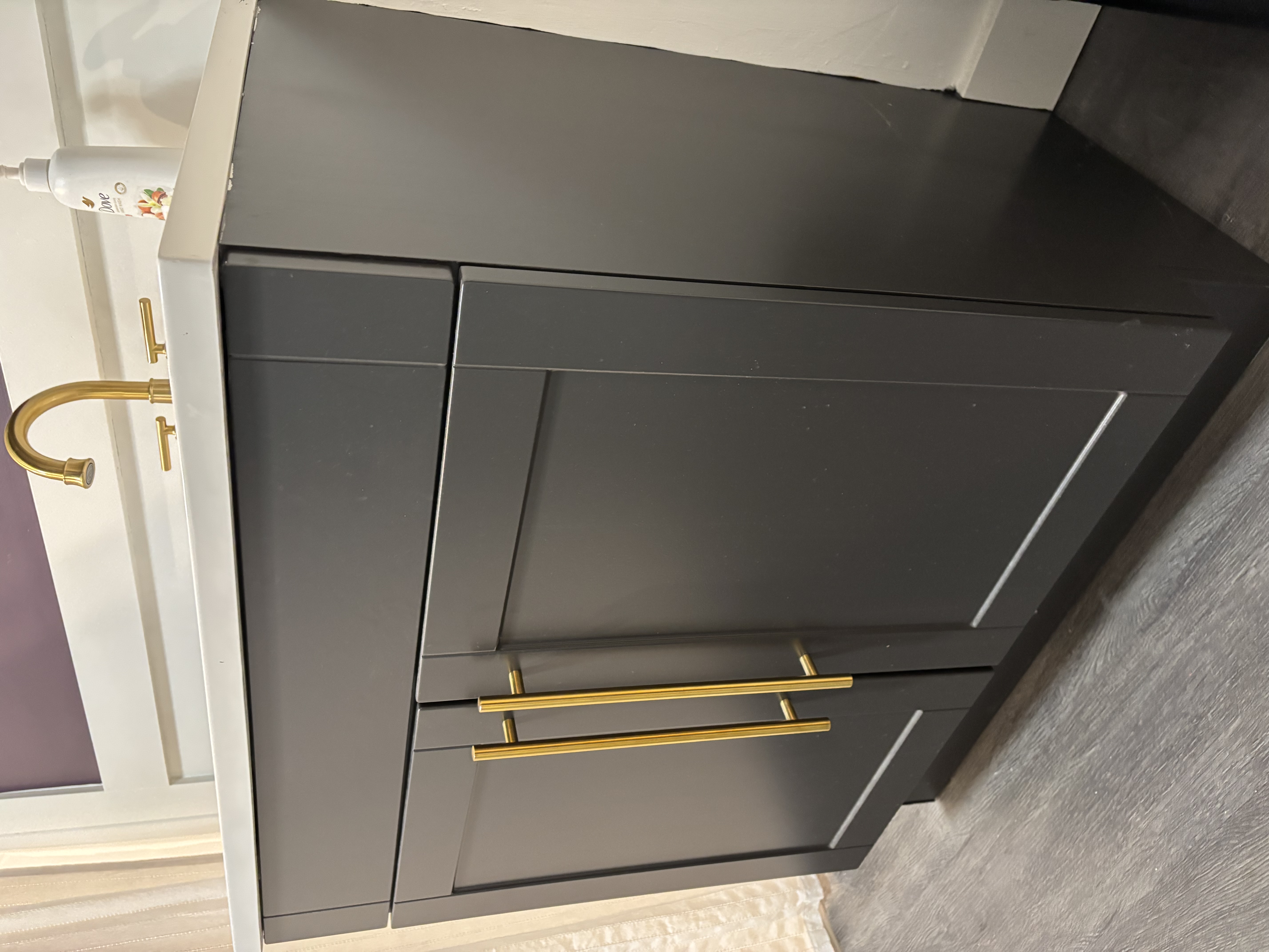 Spray refinished bathroom vanity in a Muskoka home