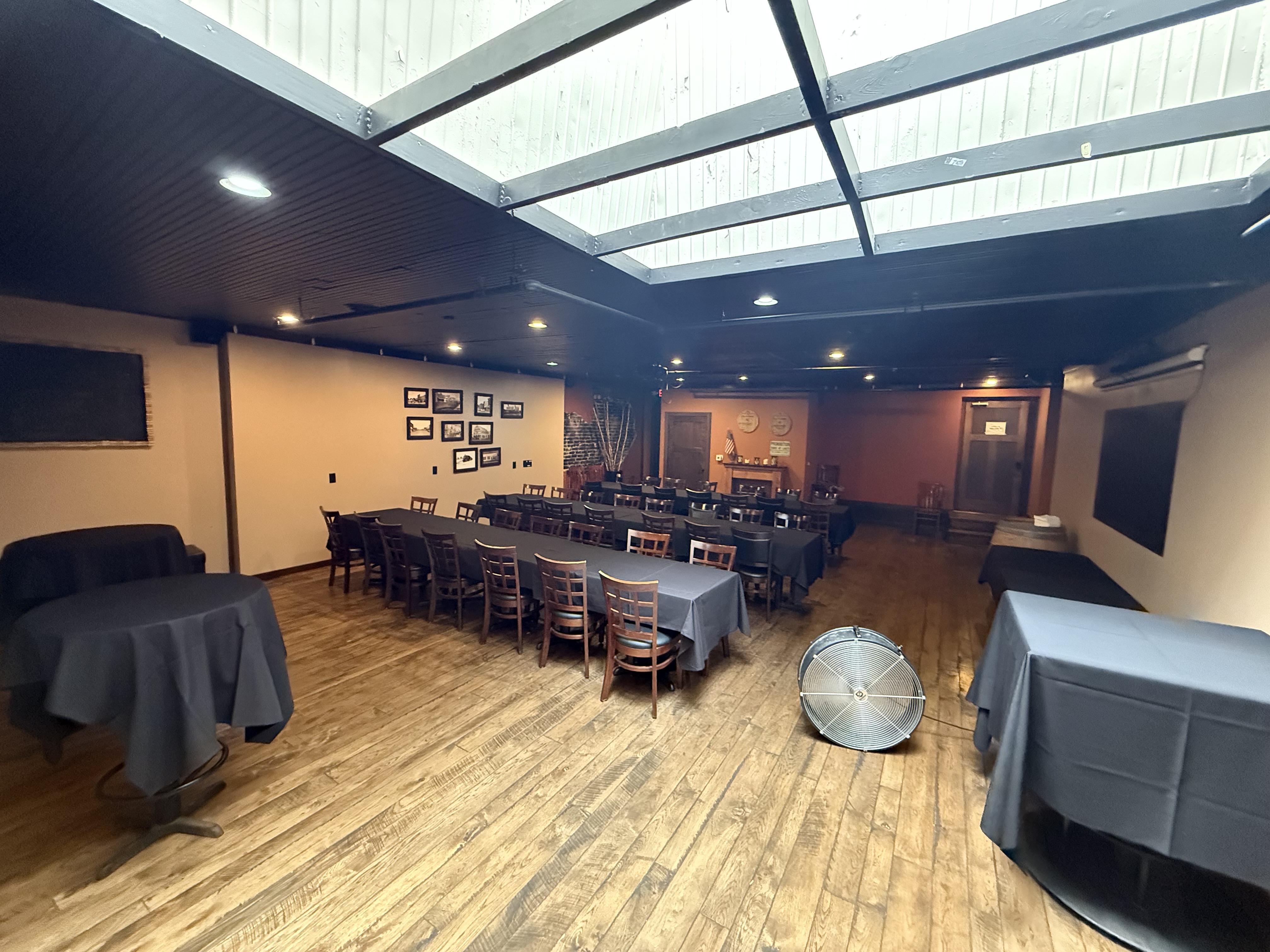 SALTiE banquet room set with tables for a private event