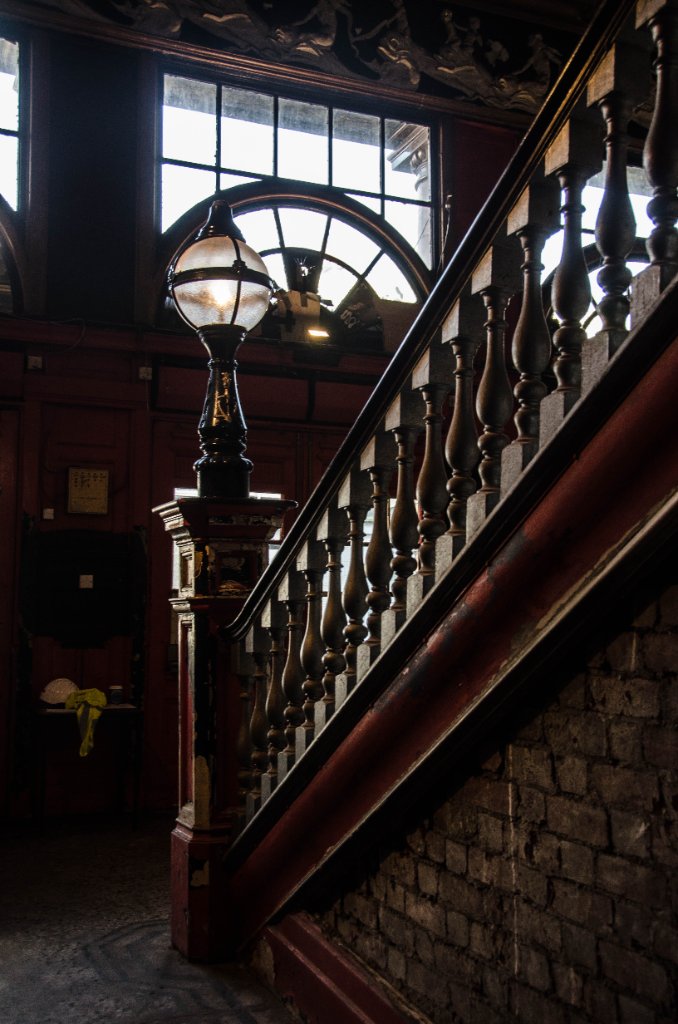 Heritage staircase and ironwork — layered history