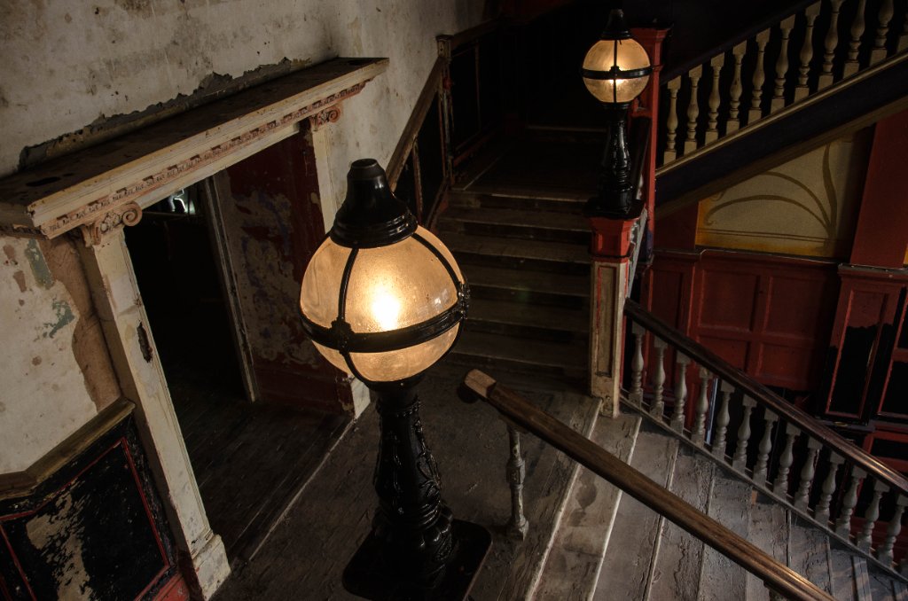 Original staircase lamps — a theatre foyer still breathing