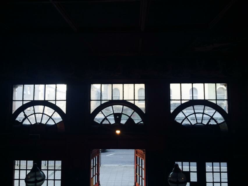 Entrance windows — light from the street