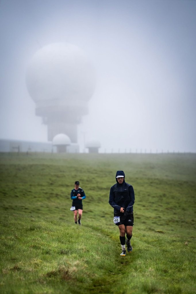 Chris Gkoufas during Ultra Scotland, two runners on the Scottish Highlands hillside in heavy rain and mist, GB Ultras race, June 2026