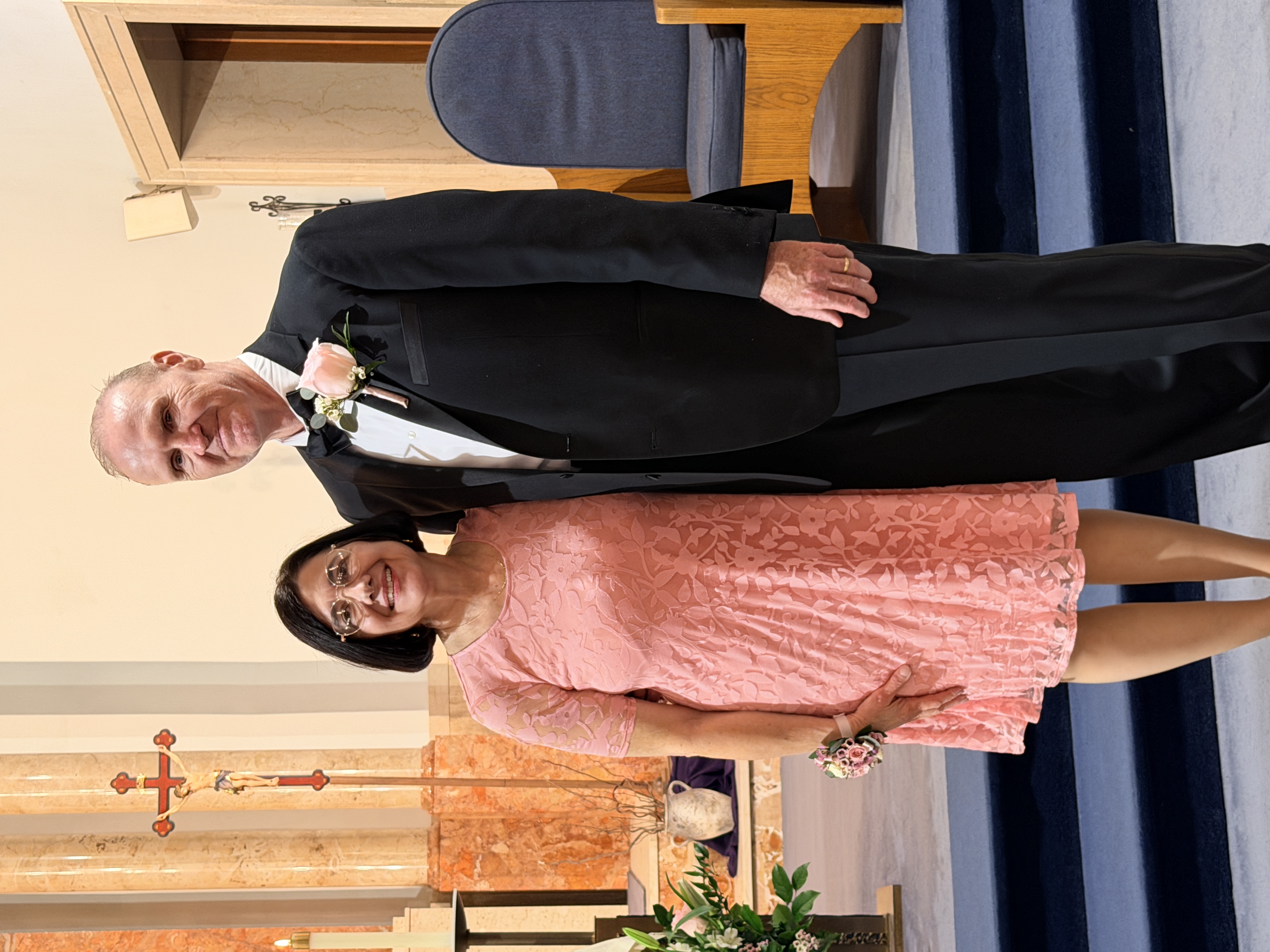 Marisa and Dan dressed up together at a formal celebration