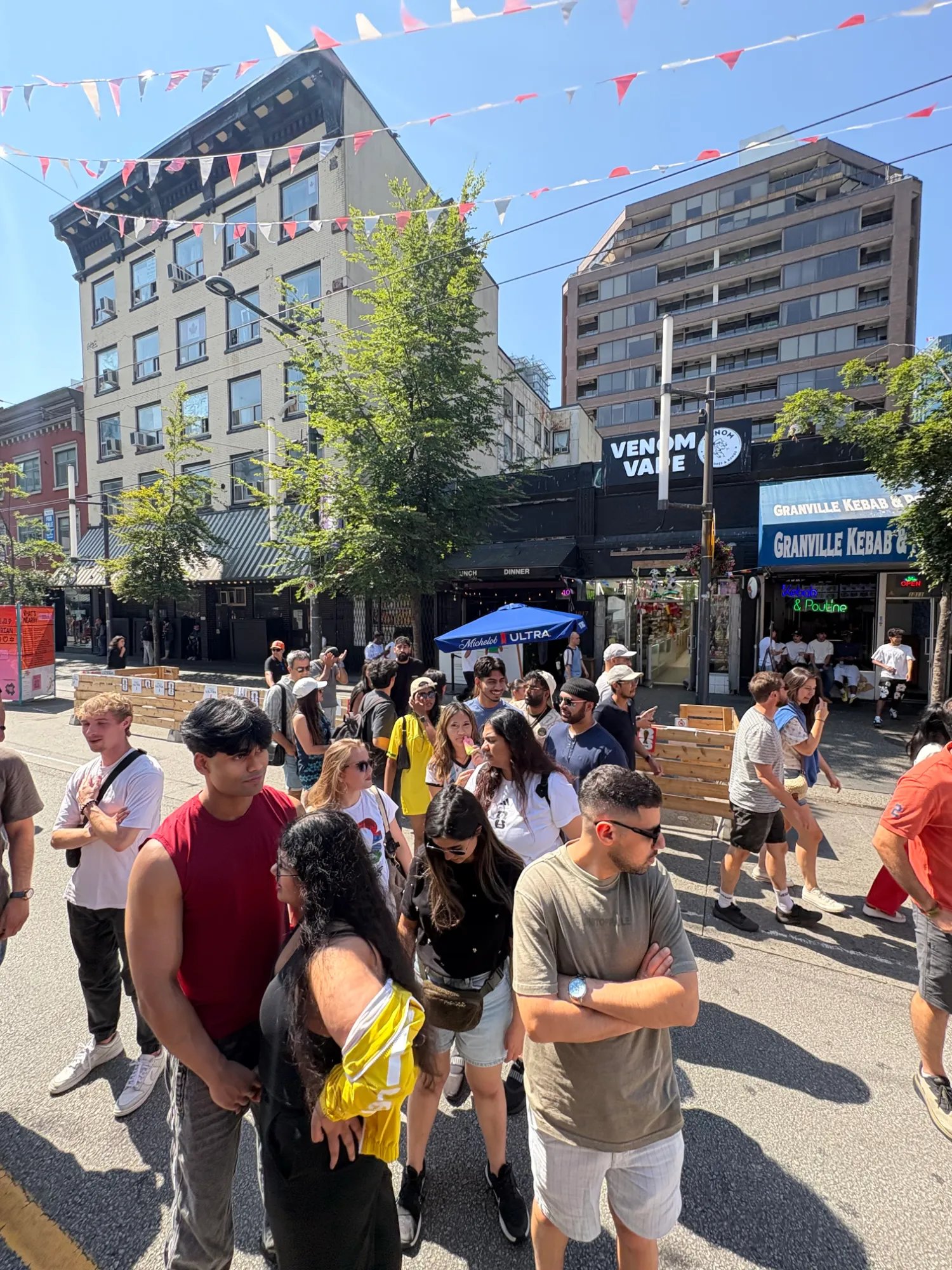 A crowd gathered on Granville Street in Vancouver during the FIFA World Cup fan zone activation