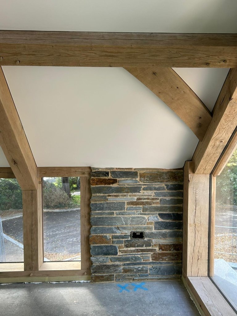 Oak frame interior with plastered ceiling