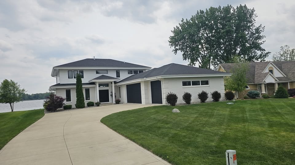 Roof soft wash treatment removing black streaks on Fort Wayne Indiana home