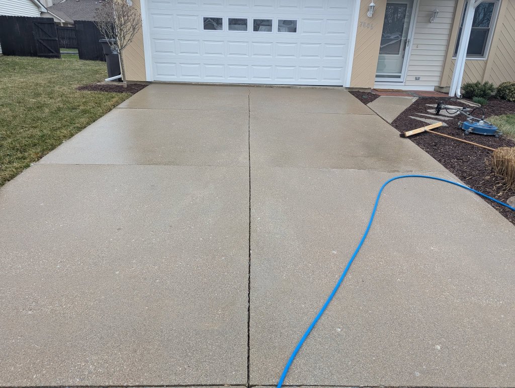 Driveway pressure washing cleaning results in Fort Wayne Indiana by Sleek Siding FW