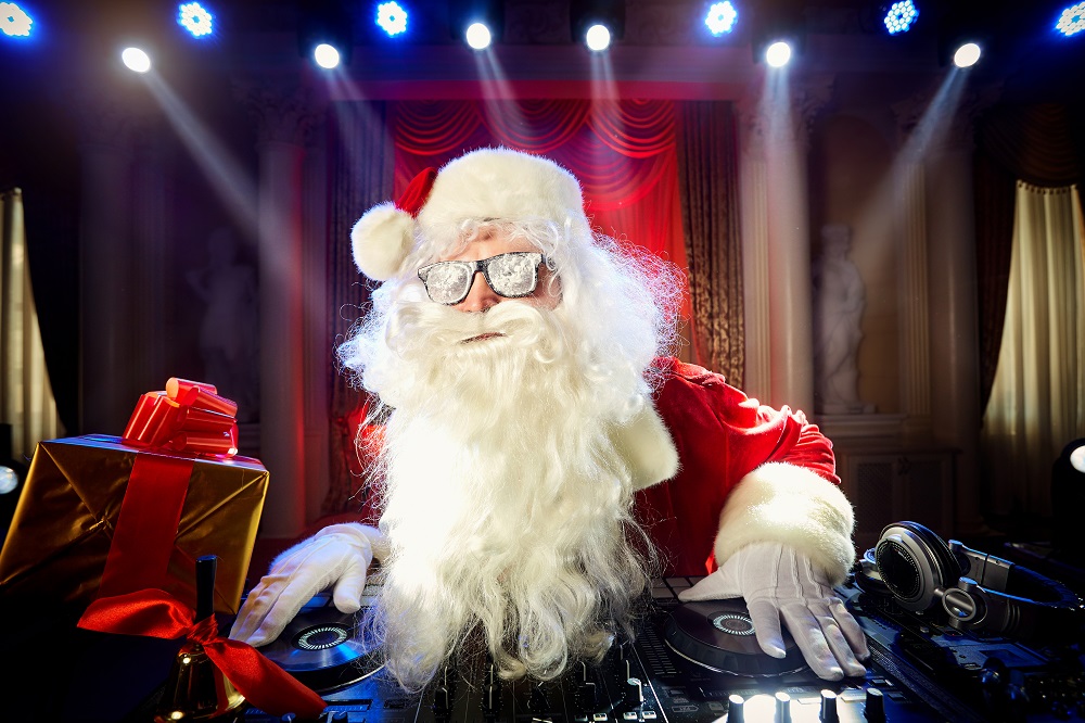 DJ Weihnachtsmann mit Disco-Lichtern