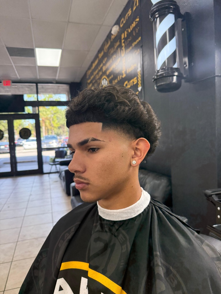 High fade with full beard