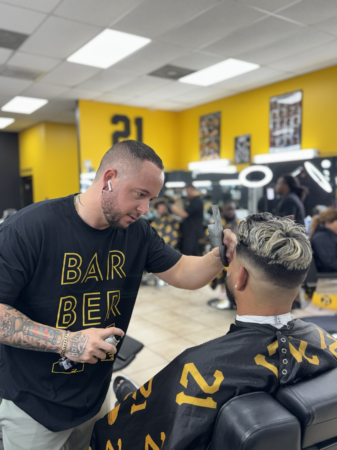 Barber showing client finished haircut