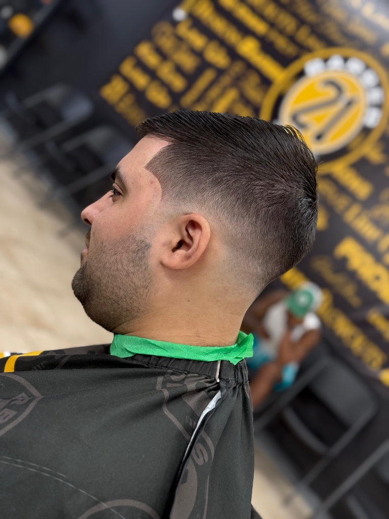 Skin fade with slick back
