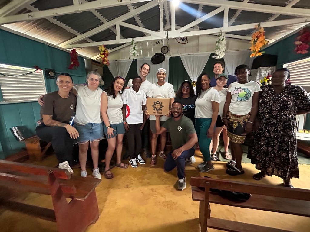 Mission team group photo inside a local church