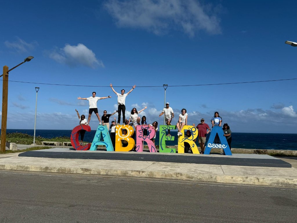 Mission team on top of the colorful CABRERA letters by the Dominican Republic coast