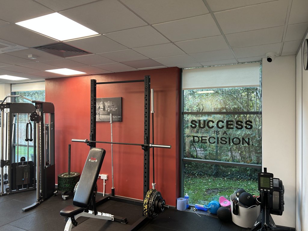 Gym with squat rack and equipment