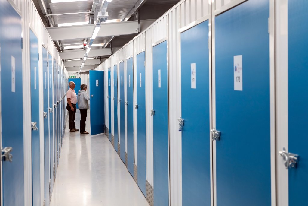 Storage unit corridor with blue doors