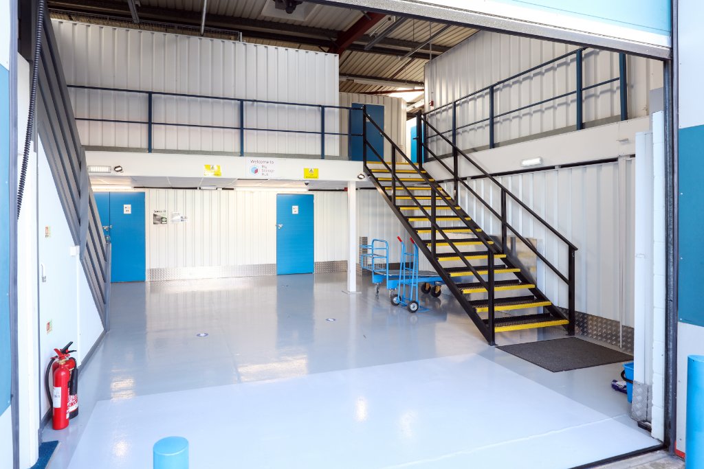 My Storage Hub interior with blue doors and staircase