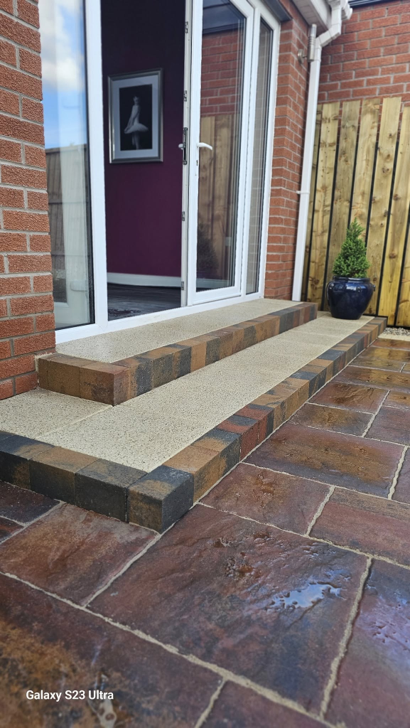 Freshly laid sandstone driveway at dusk, Belfast
