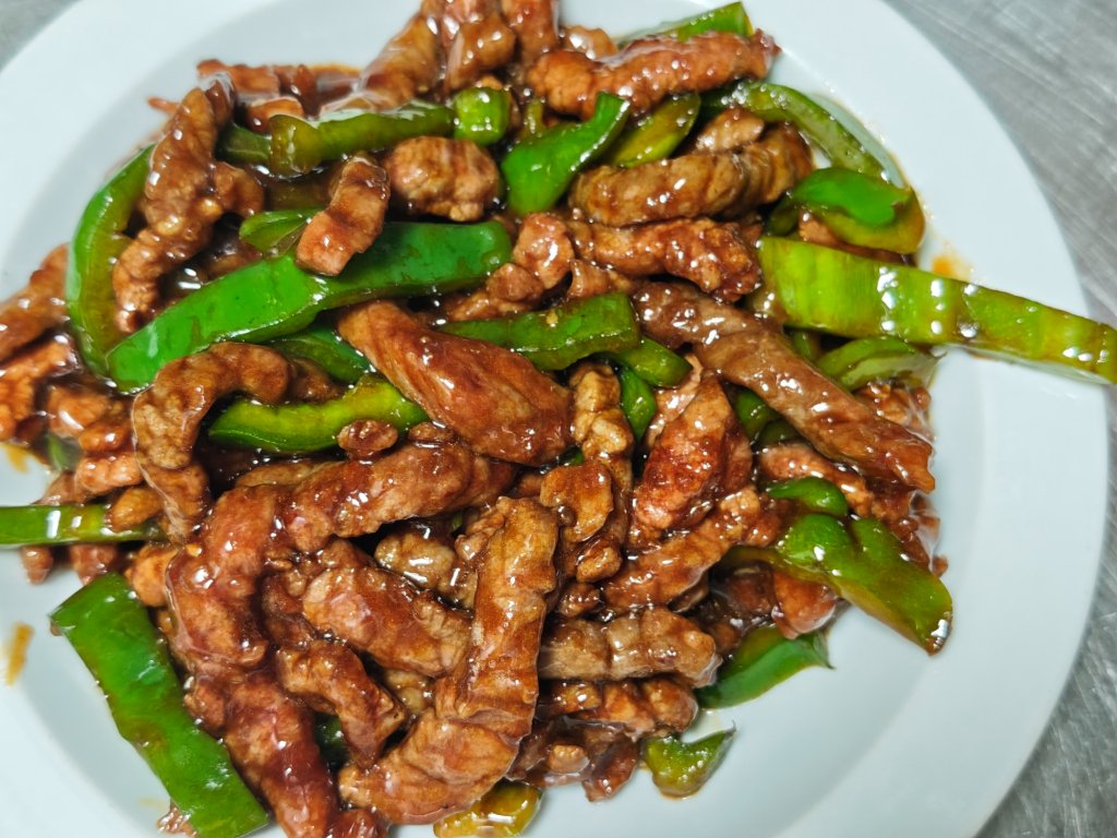 Ternera con pimientos verdes