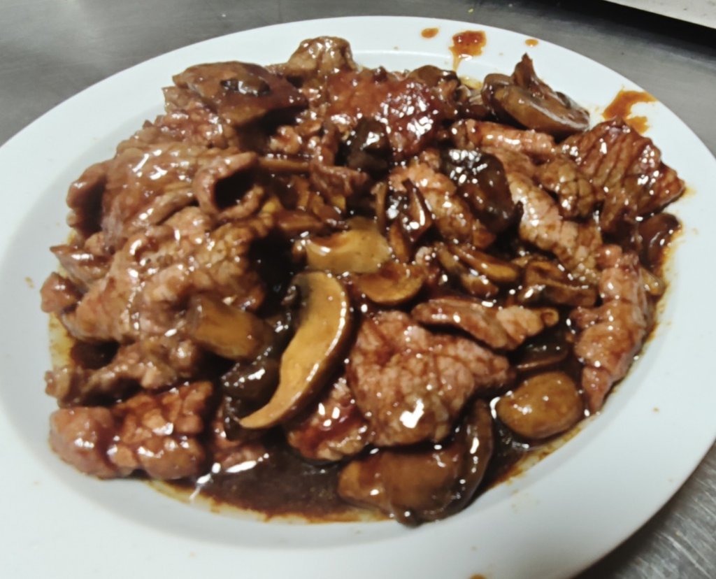 Ternera con champiñones
