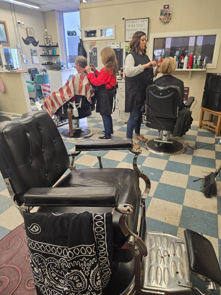 Barbers at work in the shop