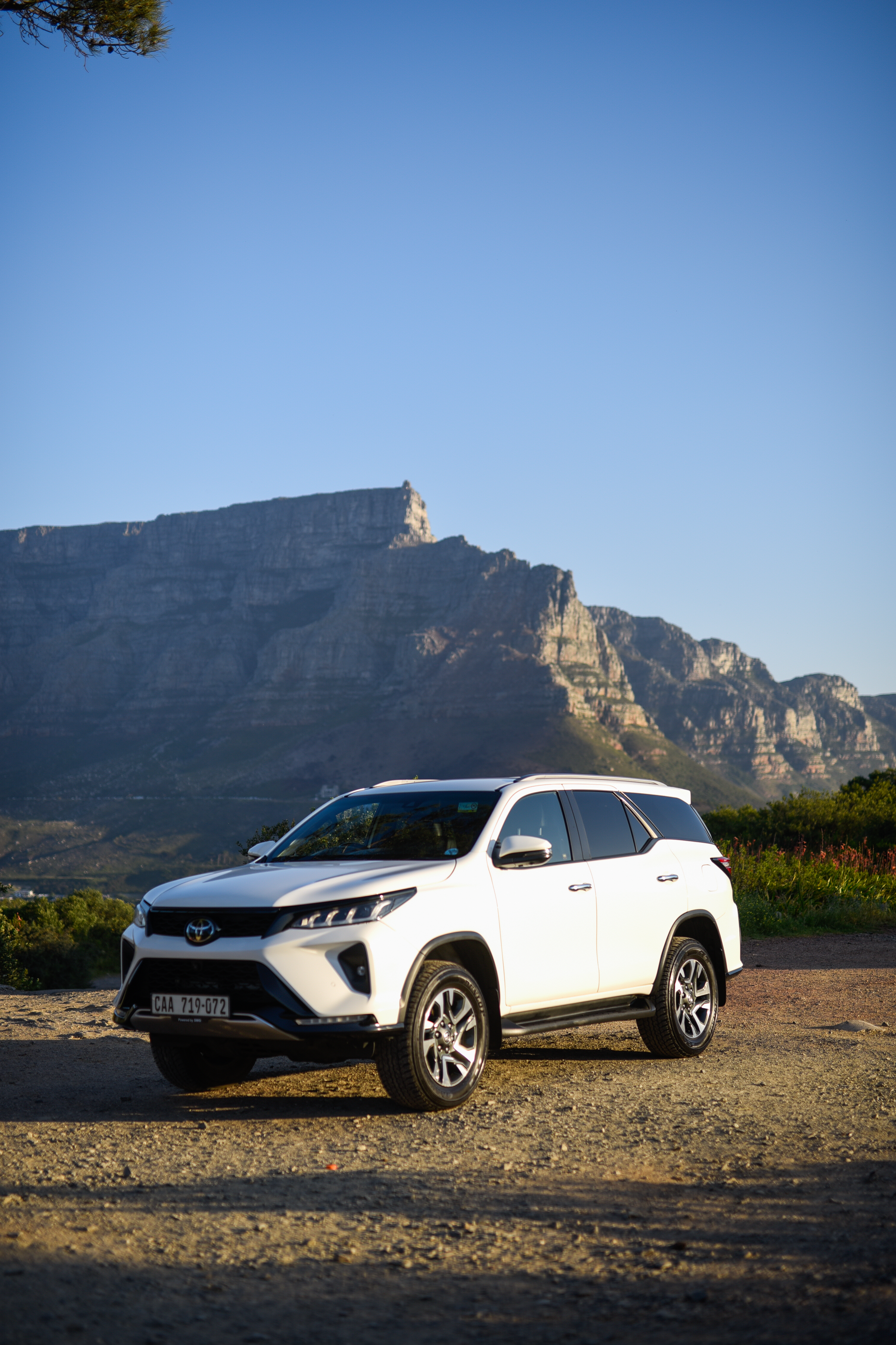 One Day Africa 7-seater Toyota Fortuner parked below Table Mountain, Cape Town