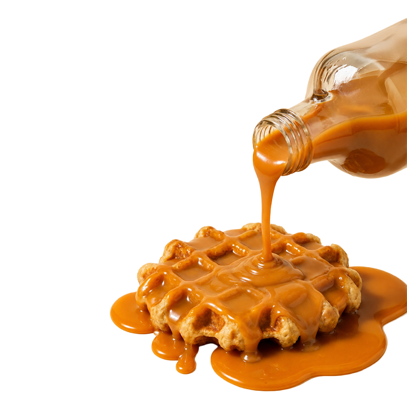 Sauce pouring onto a waffle