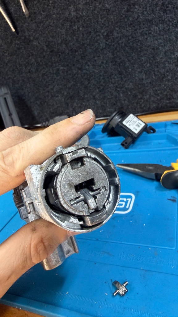 Nissan Micra K12 ignition barrel being repaired on the workbench